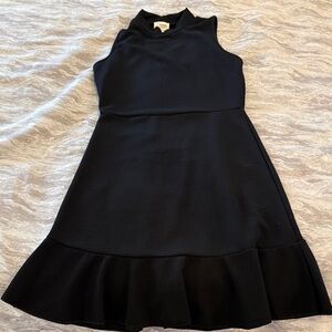Women’s brand new Sleeveless Black Knit Dress with Flounce Hem